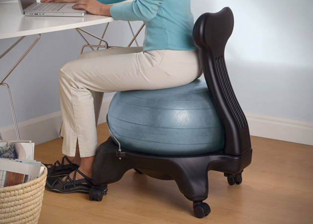 woman on yoga ball chair